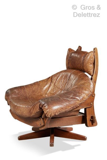 Jean GILLON, dans le goût de Armchair with rosewood structure. Seat and backrest...