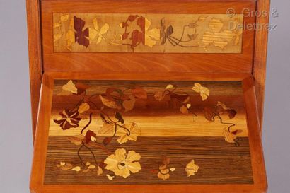 Émile GALLÉ (1846-1904) Folding writing table in carved moulded wood, inlaid top...