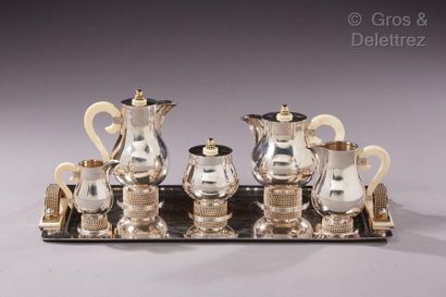 Jean DESPRES (1889-1980) Silver and ivory service including a tray, a teapot, a coffee...