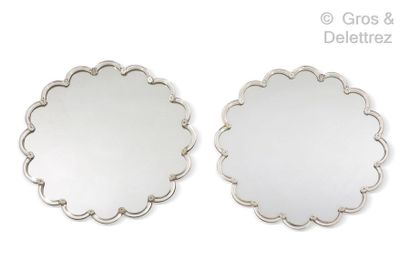 Maison BAGUÈS *Pair of mirrors of circular shape with polylobé glass outline decorated...