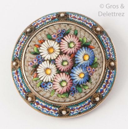 null Circular silver brooch, decorated with a micro-mosaic representing flowers in...