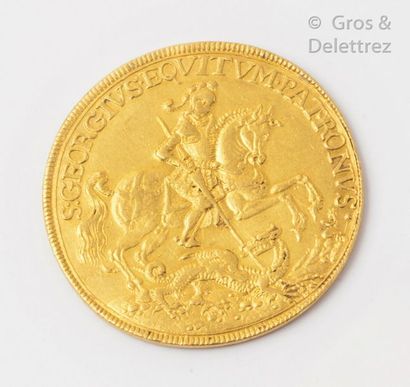 null NON VENU 
Prophylactic amulet in yellow gold representing on the obverse Saint...