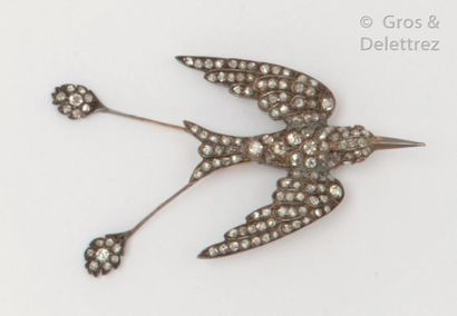 null Swallow" brooch in gold and silver entirely set with rose-cut diamonds, the...