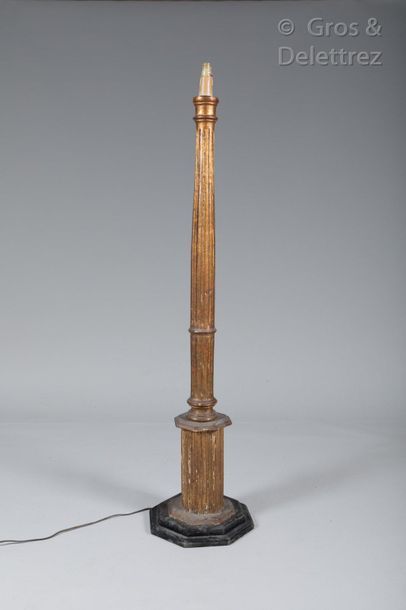 null Column-shaped floor lamp in moulded and gilded wood with fluted decoration,...