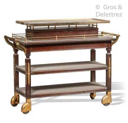 null An important 4 level wheeled sideboard in varnished wood, decorated with gilded...