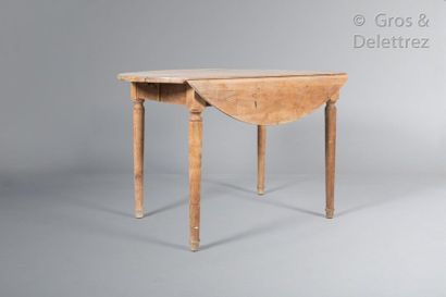 null Round fruitwood table with two folding flaps, tapered legs.

Rustic 19th century...