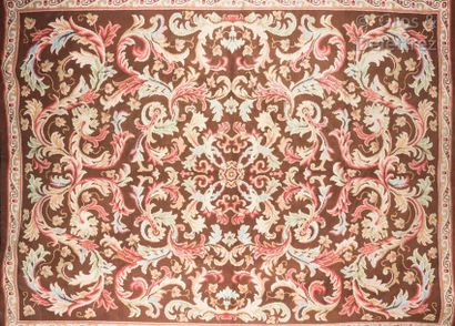 null Aubusson. Important woollen rug decorated with acanthus scrolls in cream, red,...