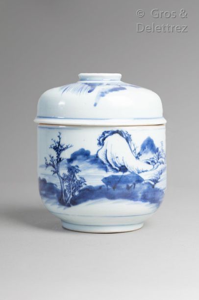 null China. Covered pot in white and blue porcelain with animated lake landscape...