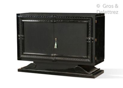 null Rectangular black lacquered wooden secretary opening by two doors and a flap...