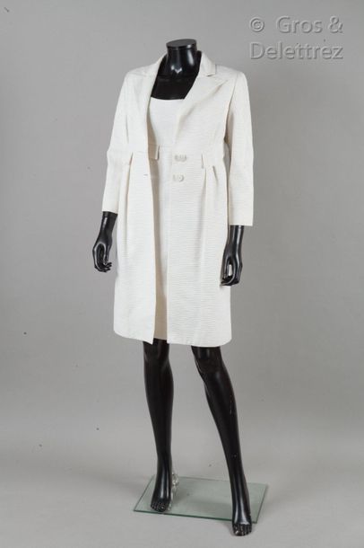 VALENTINO Circa 2002

White ribbed ensemble, made up of a dress, round neckline,...