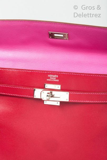 HERMÈS Paris made in France Year 2010

35cm "Kelly Upside Down" bag in ruby box,...