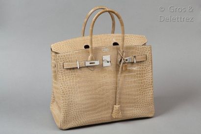 HERMÈS Paris made in France ∆ Year 2008

Bag "Birkin" 35cm in Crocodylus Porosus...