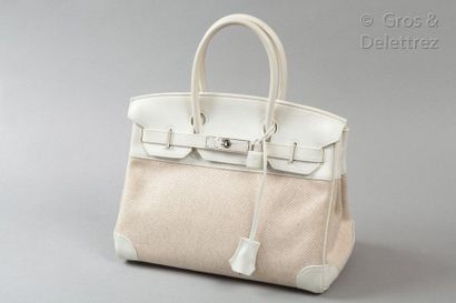 HERMÈS Paris made in France Year 2010

30cm "Birkin" bag in white Evergrain calfskin...