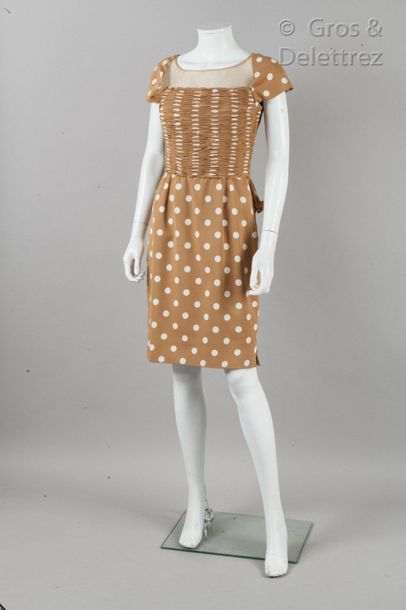 VALENTINO Boutique Circa 1997

Beige crepe dress printed with a white polka dot pattern,...