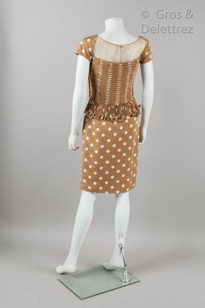 VALENTINO Boutique Circa 1997

Beige crepe dress printed with a white polka dot pattern,...