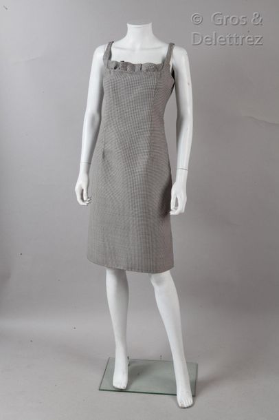 VALENTINO Circa 2010

Black and white woollen strappy dress with fleece foot pattern,...