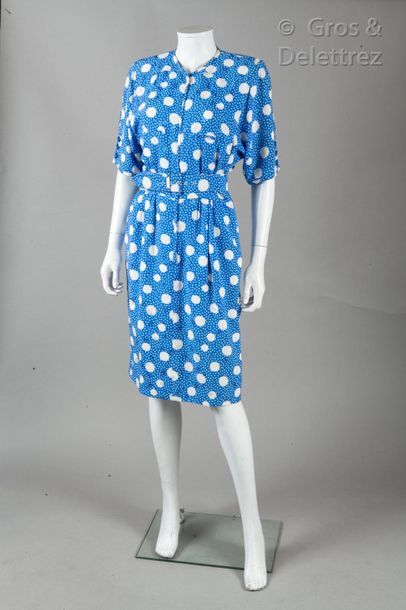 VALENTINO Circa 1980

Zipped silk dress printed with a pattern of white dots on a...
