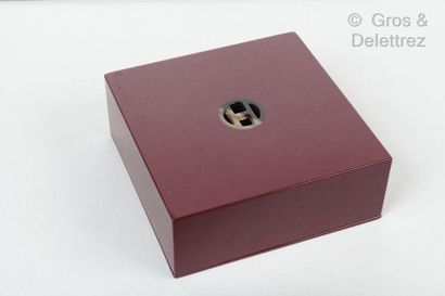 HERMES Paris made in Vietnam *Square box in burgundy lacquered wood, lid pierced...