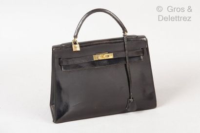 HERMES Paris *Bag " Kelly Sellier " 33cm in black box, gold plated fasteners and...