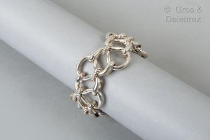 HERMES Paris * 925 sterling silver bracelet with interlacing pattern and rope rings....