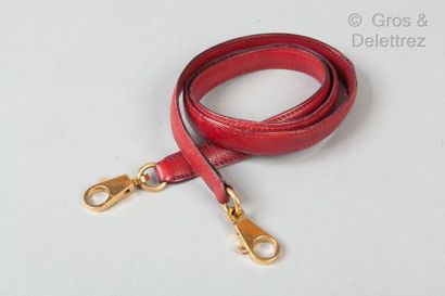 HERMÈS Paris made in France * Shoulder strap in red Courchevel leather, golden metal...