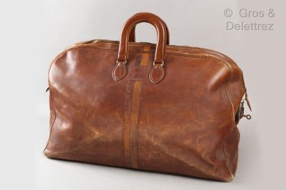 HERMES 24 Fb Saint Honoré Paris *Brown leather weekend bag, R.G.V encrypted, decorated...