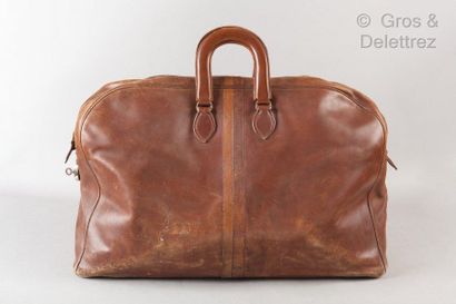 HERMES 24 Fb Saint Honoré Paris *Brown leather weekend bag, R.G.V encrypted, decorated...