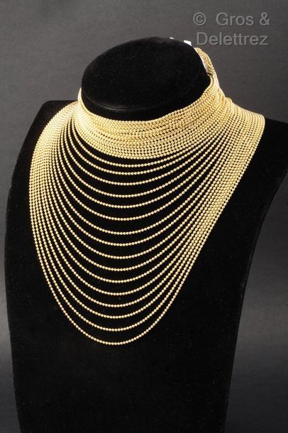 CARTIER "Drapery" - Beautiful necklace made of thirty-four beaded chains. The clasp...