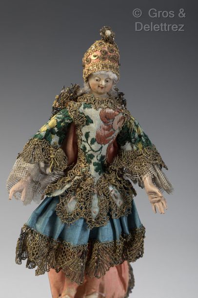 null Amazing wax-headed figure wearing a Grand siècle stage costume.

This curious...