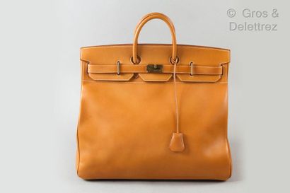 HERMES Paris made in France année 1989 *50cm travel "Top Strap Bag" in natural leather,...