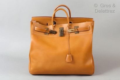 HERMES Paris made in France année 1989 *50cm travel "Top Strap Bag" in natural leather,...