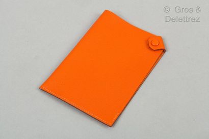 HERMES Paris * Orange calfskin passport envelope, tongue-and-groove closure with...