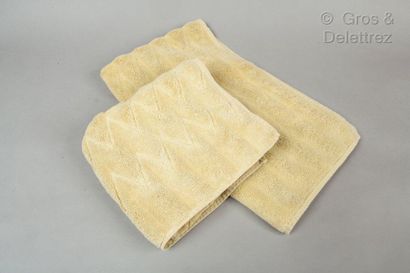 HERMÈS Paris made in Belgium *Batch of two almond terry cotton towels with a herringbone...