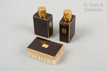 HERMÈS Paris made in France *Set consisting of two black enamelled gold metal flasks...