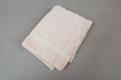 HERMÈS Paris made in Belgium *White cotton terry cloth bath mat with "H" pattern....
