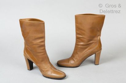 HERMES Paris made in Italy *Pair of olive lamb leather half boots with heavy stitching,...