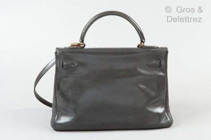 HERMES Paris *Bag " Kelly Retourné " 32cm in grey box, gold plated fasteners and...