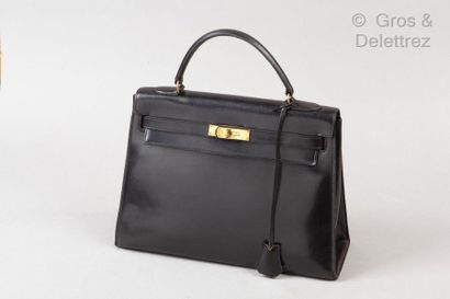 HERMES Paris *Bag " Kelly Sellier " 33cm in black box, gold plated fasteners and...
