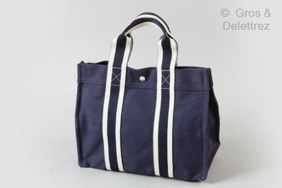 HERMÈS Paris made in France *Bag " Toto " 35cm in navy canvas, double handle striped...