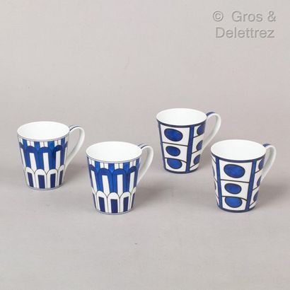 HERMES Paris *Batch including four high porcelain cups "Bleus d'Ailleurs".