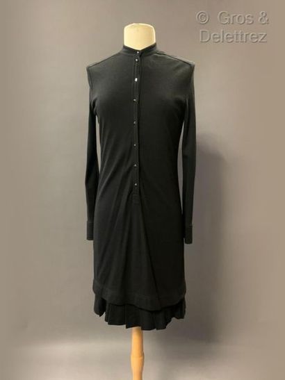 HERMES Paris Dress in black wool jersey, round neckline, single button plated silver...