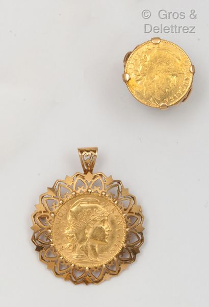 null Yellow gold lot, comprising a ring set with a 10 French Francs 1911 coin and...