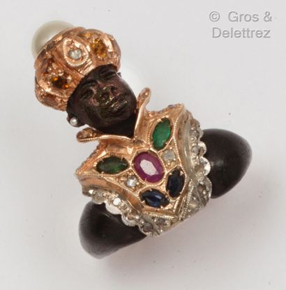 null Tête de Maure" ring in pink gold (9K) and silver, enriched with sapphires, emeralds,...