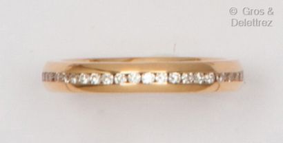 BACHET Rose gold wedding band, adorned with a line of brilliant-cut diamonds in a...
