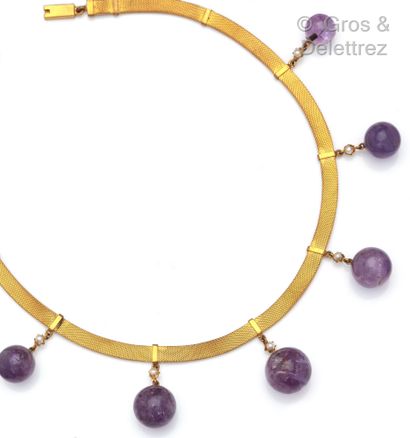 null Flexible necklace in gold-plated metal enriched with pendants of falling amethyst...