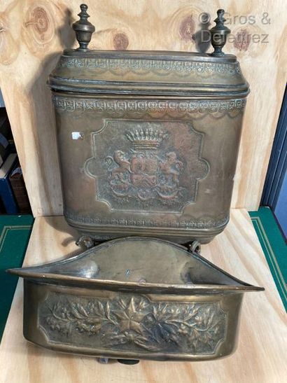 null Water fountain and its basin in embossed brass decorated with coats of arms...