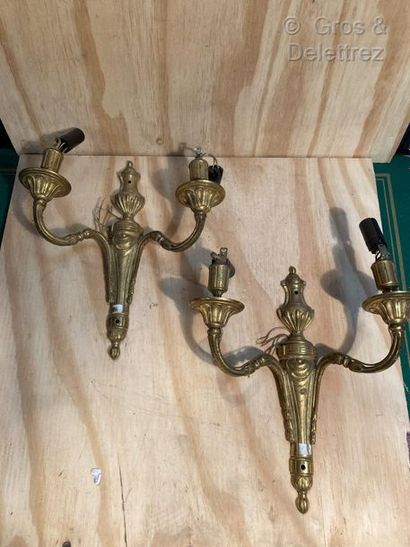 null A pair of Louis XVI style gilt bronze sconces with two light arms. 

High. :...