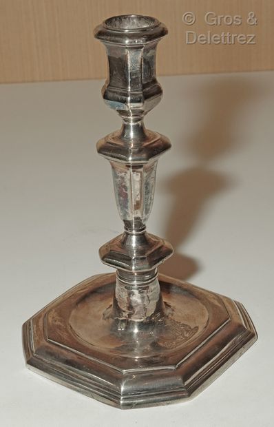 null Silver torch, the shaft in baluster, the octagonal base engraved with a coat...