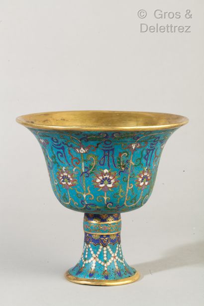 CHINE A cloisonné bronze flared bowl on a pedestal decorated with foliage and characters...