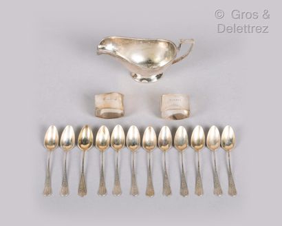 null Set of twelve small spoons in vermeil with engraved decoration of foliage. 

Hallmark...